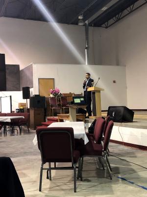 Pastor Charles Rogers addressing the attendees of the Washington Park Community Impact Forum.