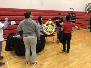 McKendree Health & Wellness students testing the Belle Valley K-8 Family Fit Night attendees on health & wellness topics. 